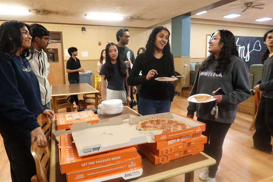 Stethoscope Launch Party students with pizza