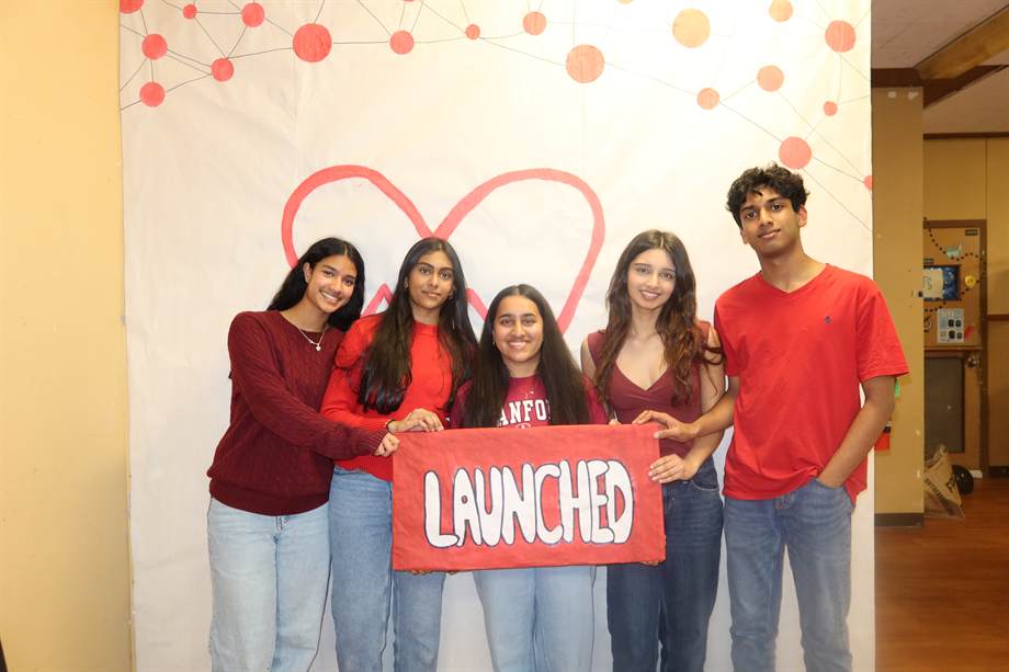 Stethoscope Launch Party group holding launch sign